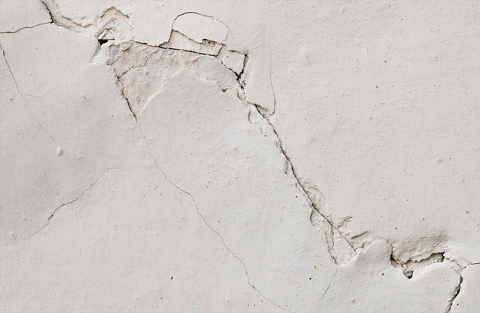 A crack running down the foundation slab of a home