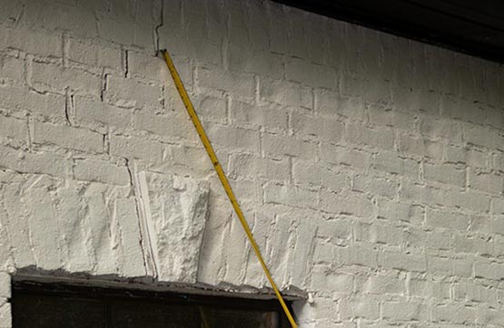 bowing basement walls cracked foundation problem